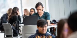 A student working on their laptop